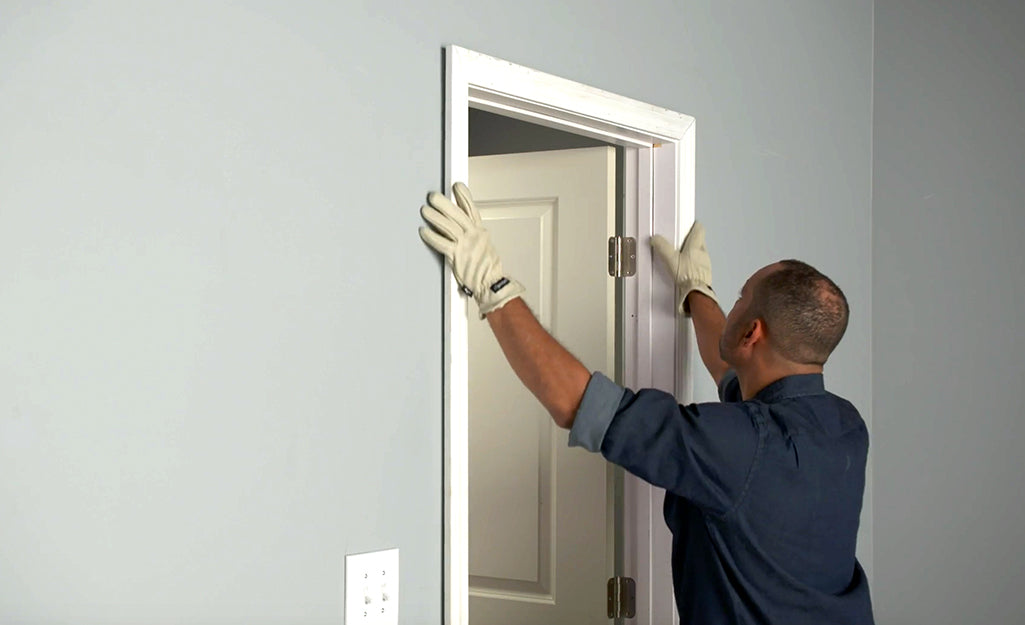 Interior door casing installation (per side 6/8" high) image 0